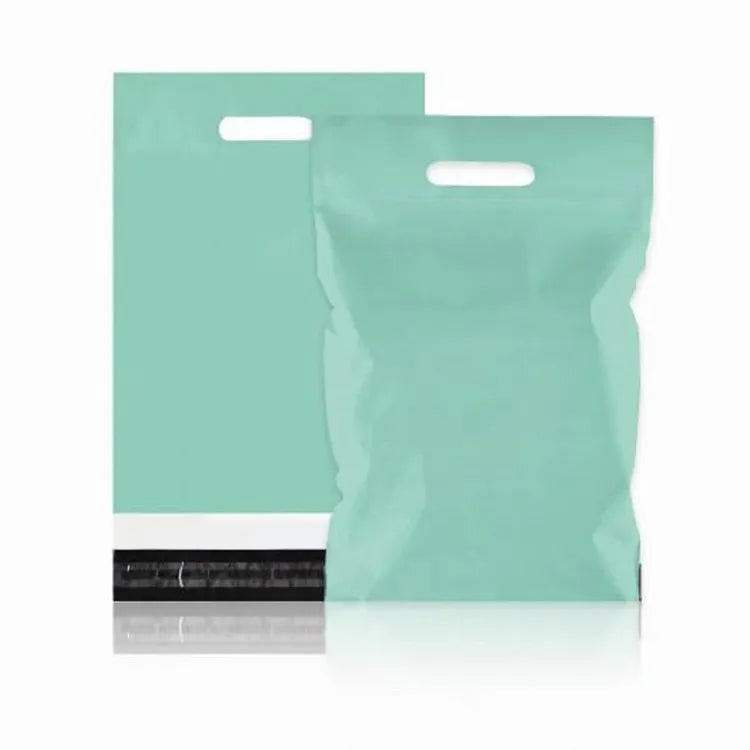 Two mint-green die-cut handle mailer bags showing the front and black bottom closure flap