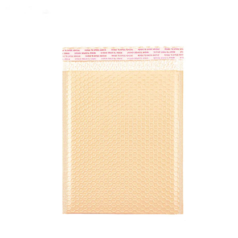 Tan padded mailing envelope with a pale peel-off adhesive closure strip