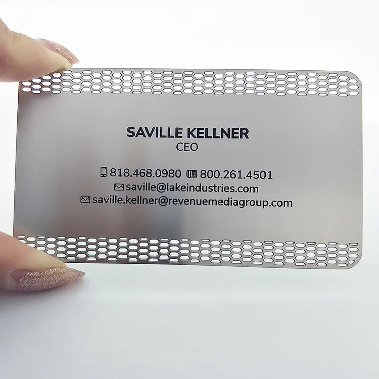 Silver-tone metal business card with perforated borders and centered contact lettering