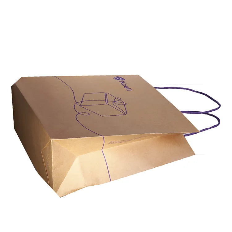 Brown paper bag with purple cord handles lying flat with its folded bottom visible