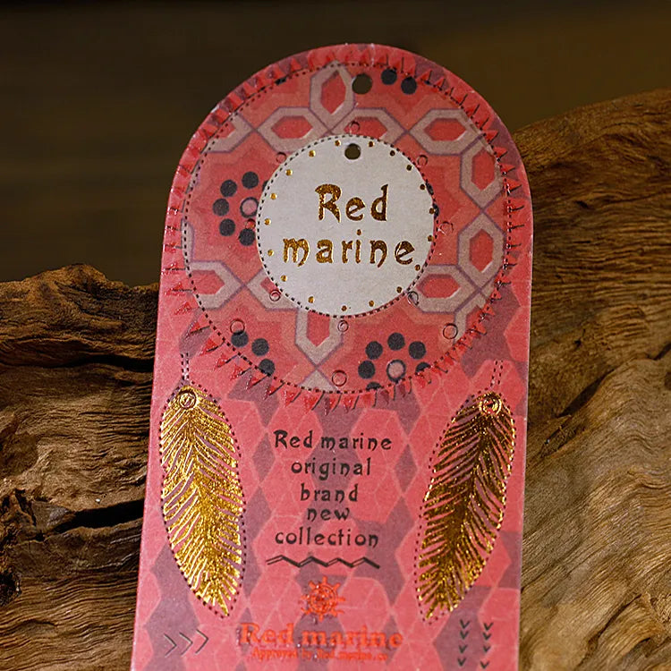 Pink illustrated hang tag with rounded top and decorative printed artwork