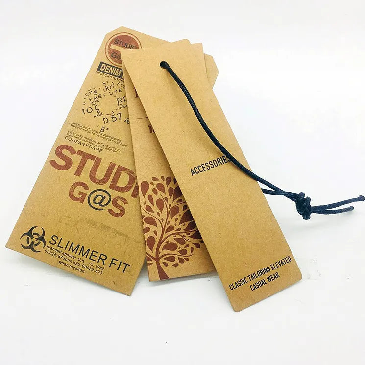 Brown kraft-style hang tags with black strings and printed lettering