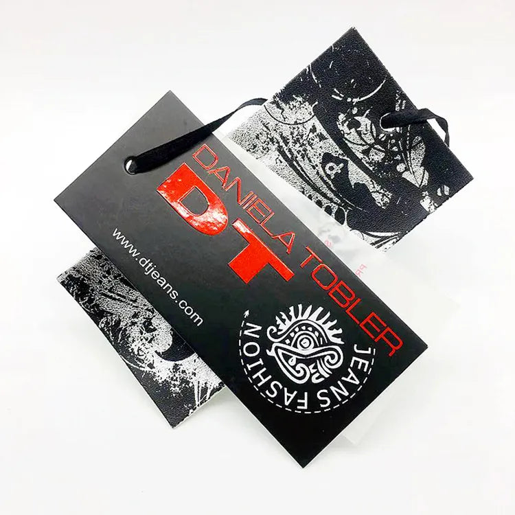 Black printed hang tag samples with white graphics and red lettering