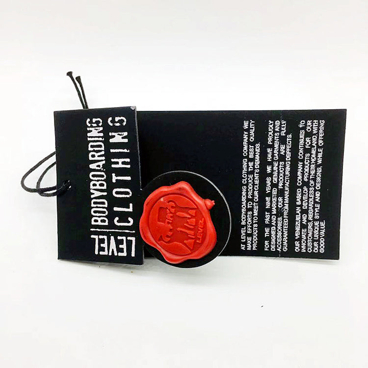 Custom Black Cardstock Hang Tag with 3D Rubber Logo – Dimensional Brand Emblem on Card