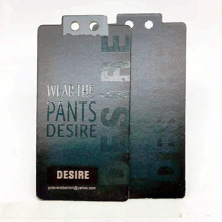 Grey clothing hang tag with green gradient artwork and shaped attachment tab