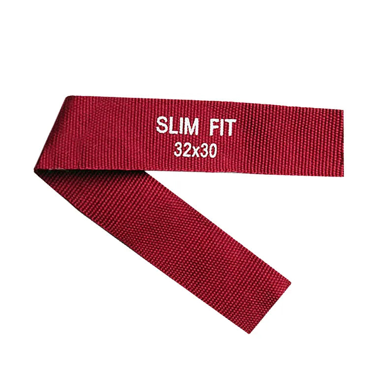 Red folded ribbon label with white SLIM FIT lettering and a size code