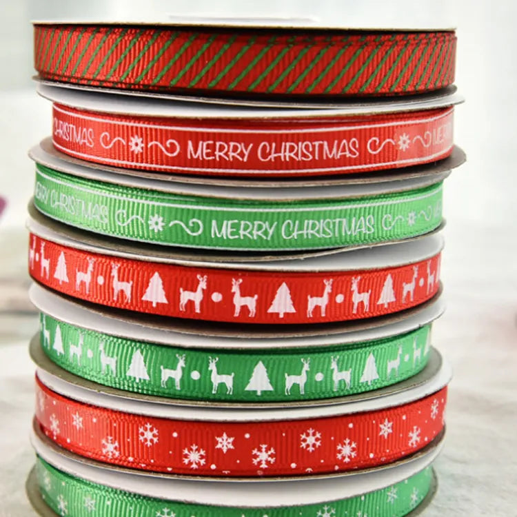 Holiday ribbon rolls featuring snowflake, Christmas tree and reindeer patterns