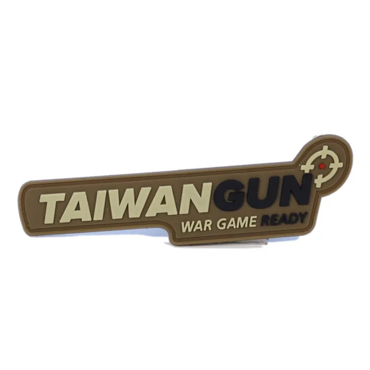 Custom coyote tan PVC tactical morale patch with raised TAIWAN GUN lettering and target emblem