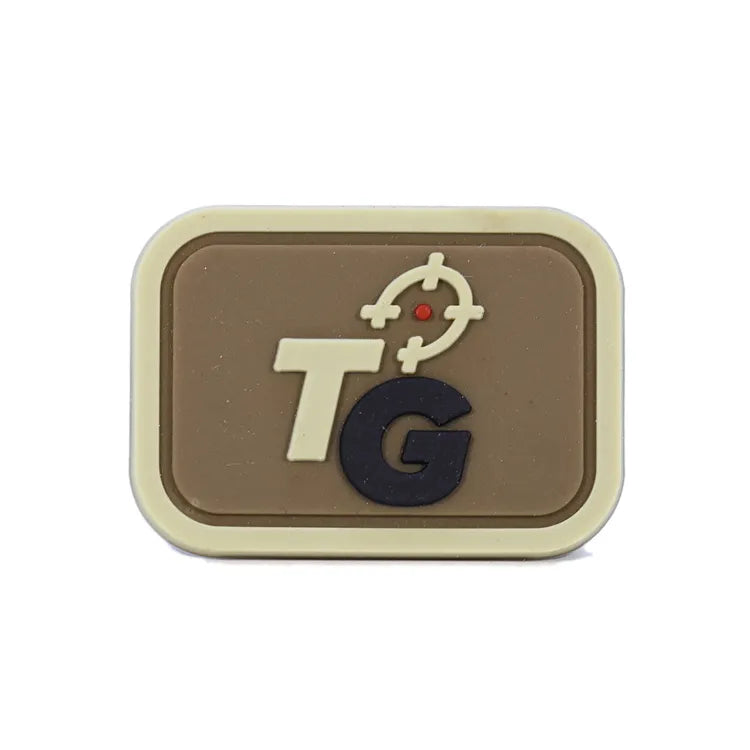 Custom PVC airsoft combat emblem with hook-and-loop backing for a tactical helmet