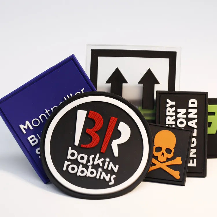 Round and rectangular molded logo patch samples in contrasting colors