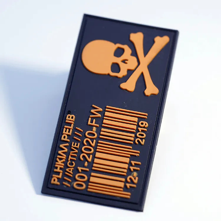 Custom tactical skull and crossbones PVC rubber morale patch with raised lettering