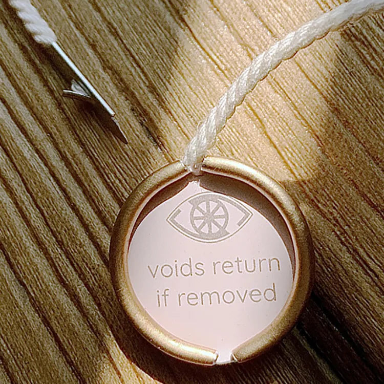 Round plastic security seal tag with ring and white braided cord