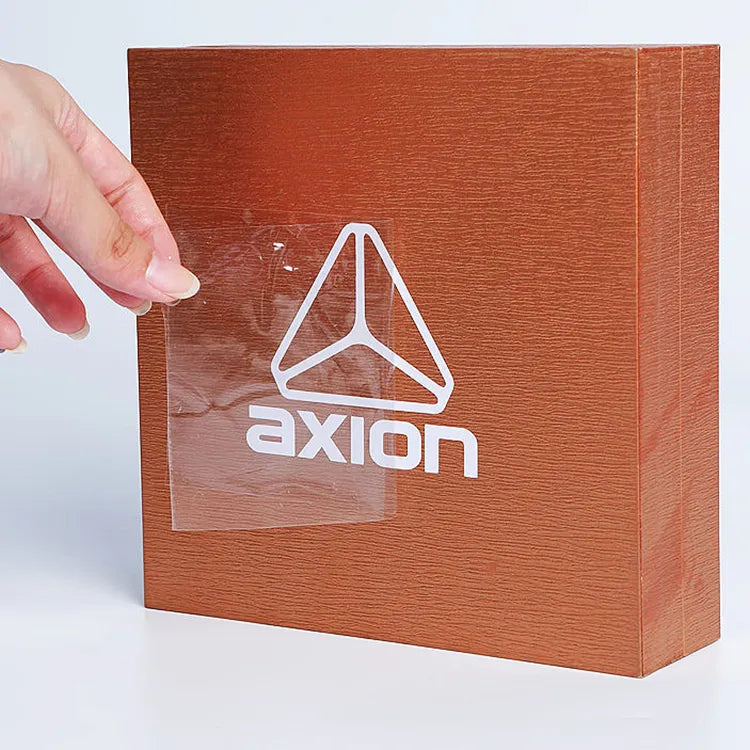White logo on a brown packaging box with clear transfer film