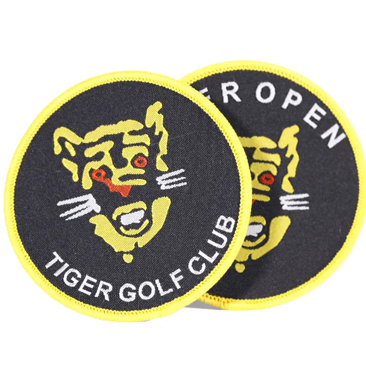 Custom black and yellow embroidered Tiger Golf Club patches with stylized tiger head emblem