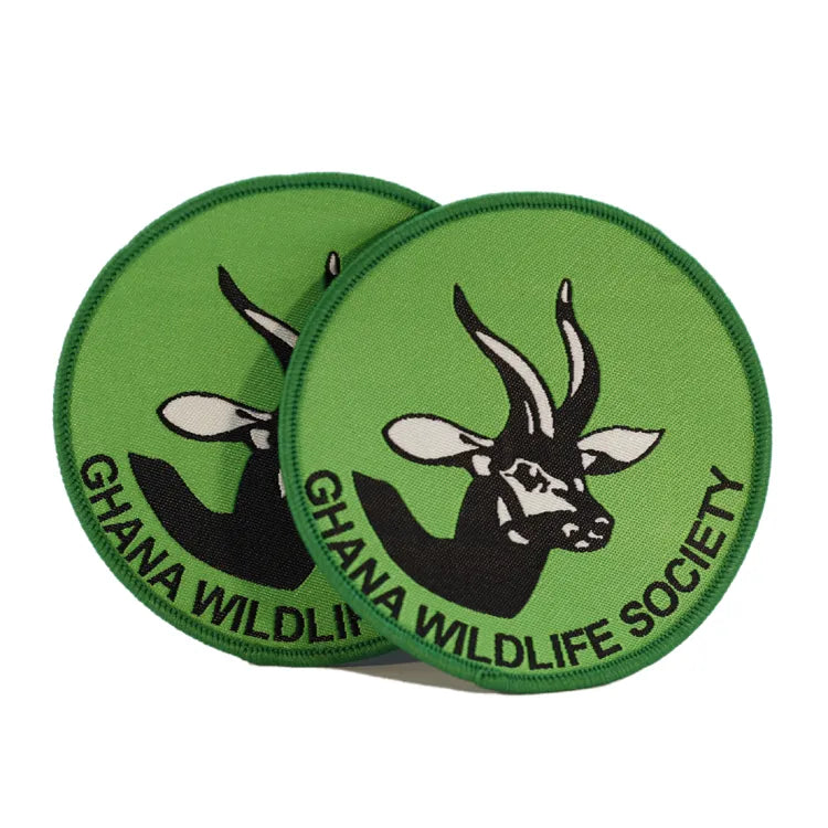 Custom green embroidered wildlife patch with black antelope emblem and Ghana Wildlife Society lettering