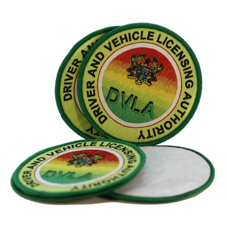 Custom green circular embroidered driver and motor vehicle licensing authority badge with DVLA lettering