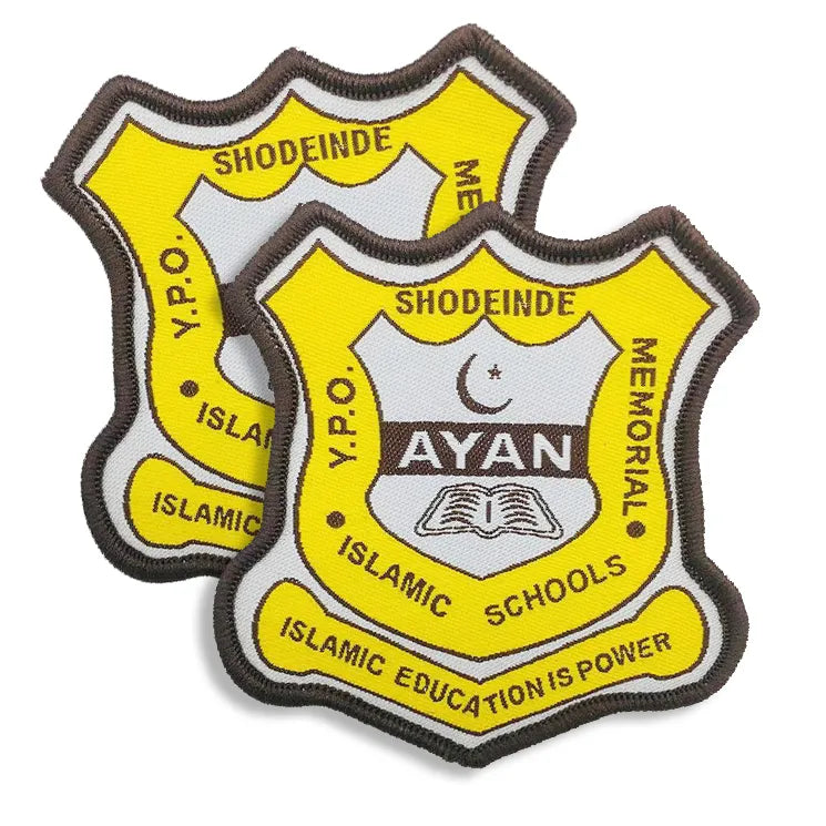 Custom yellow embroidered Islamic school shield patches with crescent moon, open book and educational lettering