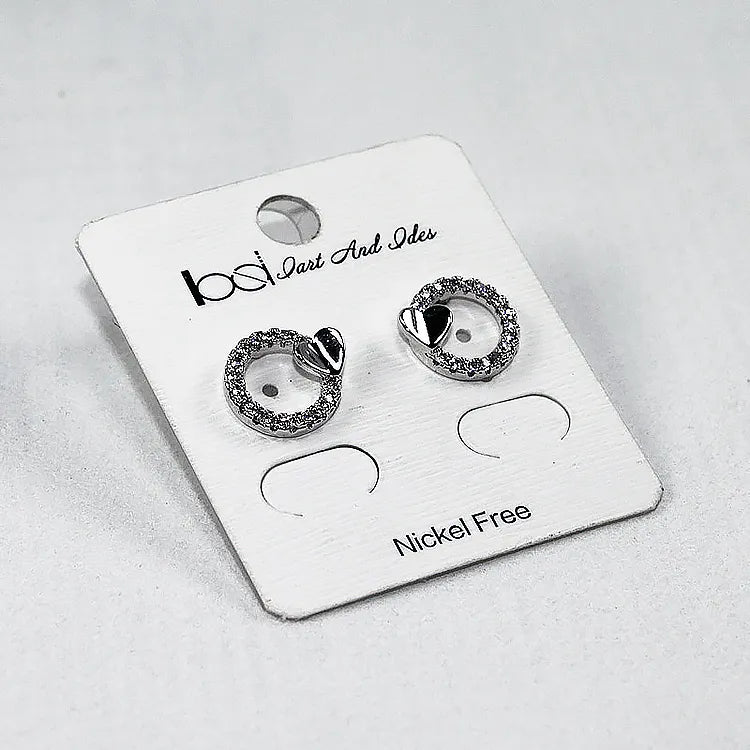 White stud earring card with clean perimeter cuts and mounted rhinestone studs