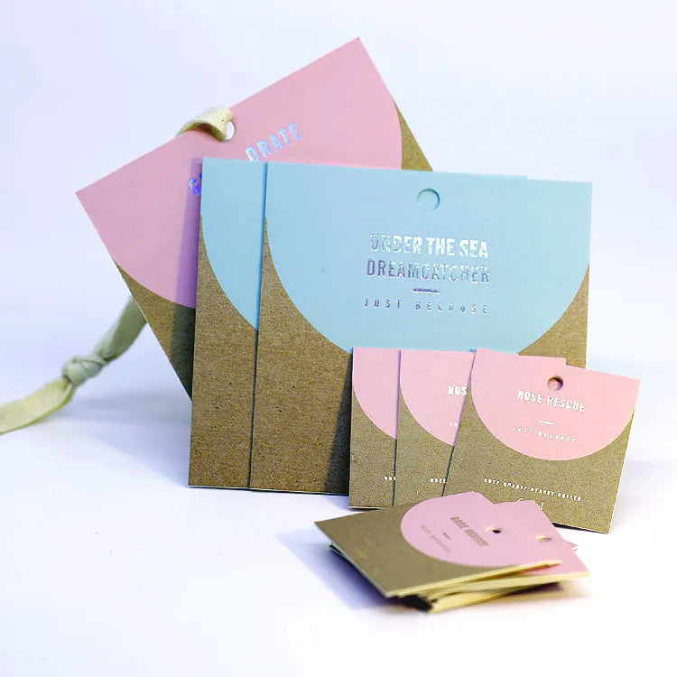 Coordinated retail packaging collection featuring gift packaging cards and display tags