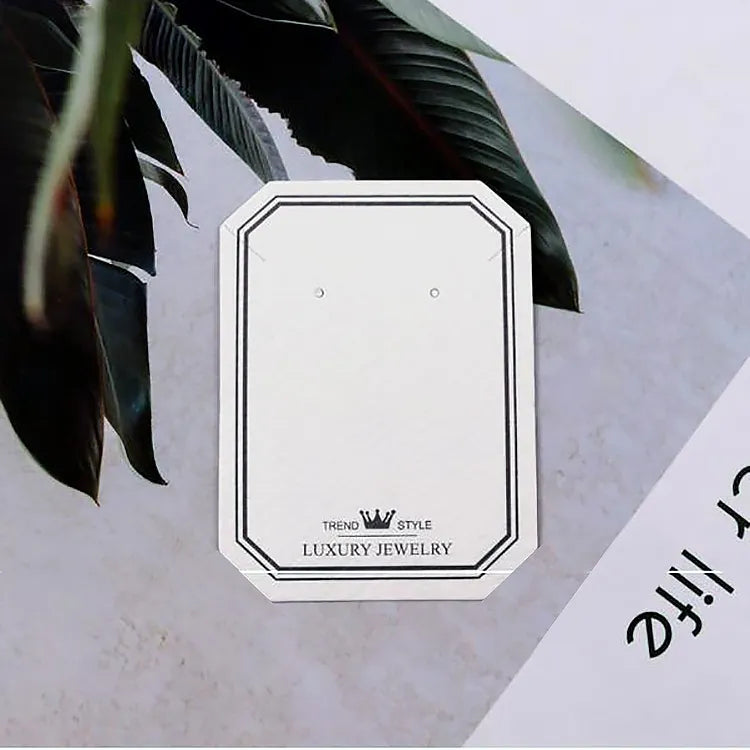 Octagonal clipped corner jewelry card with top corner necklace mounting slots
